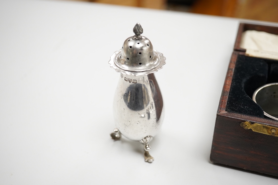 Three assorted 20th century silver napkin rings, a George V silver mustard pot and pepperette, a set of six late Victorian silver coffee spoons, London, 1883, and six other silver items.
